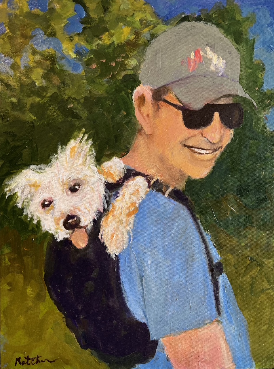 Man carrying dog in backpack